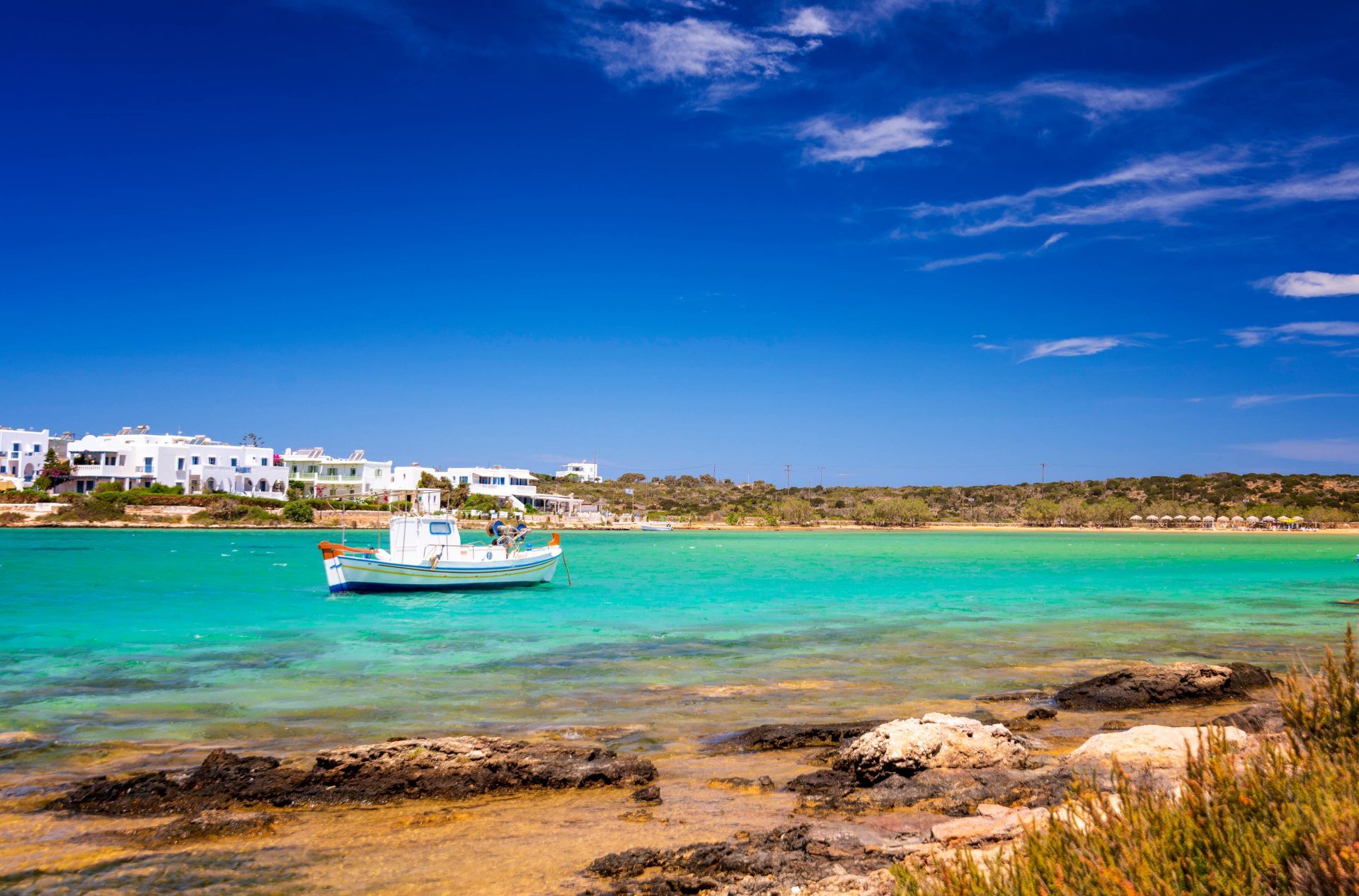Turquoise water and moored boats off Antiparos, next to Paros