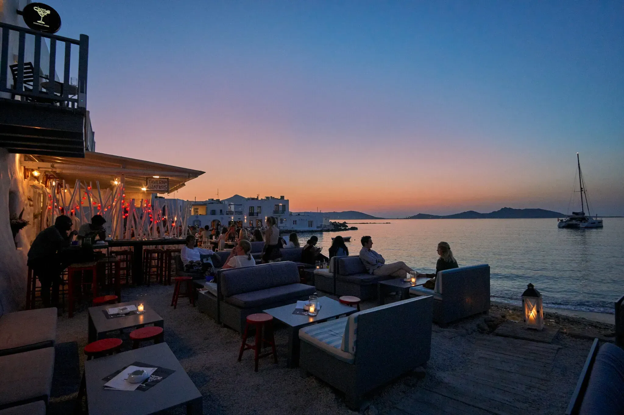 A seaside bar at sunset on Paros